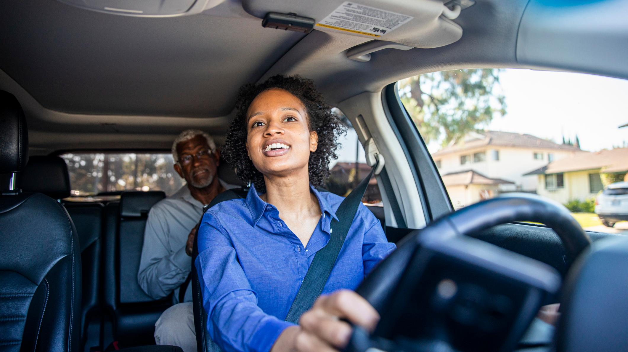 An uber driver picking up client 1000x560